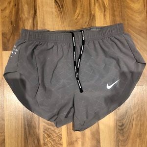 Nike women’s high cut running shorts grey